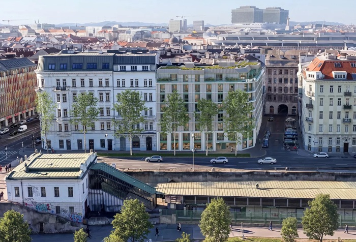 Rendering eines mehrgeschossigen langgestreckten Gebäudes
